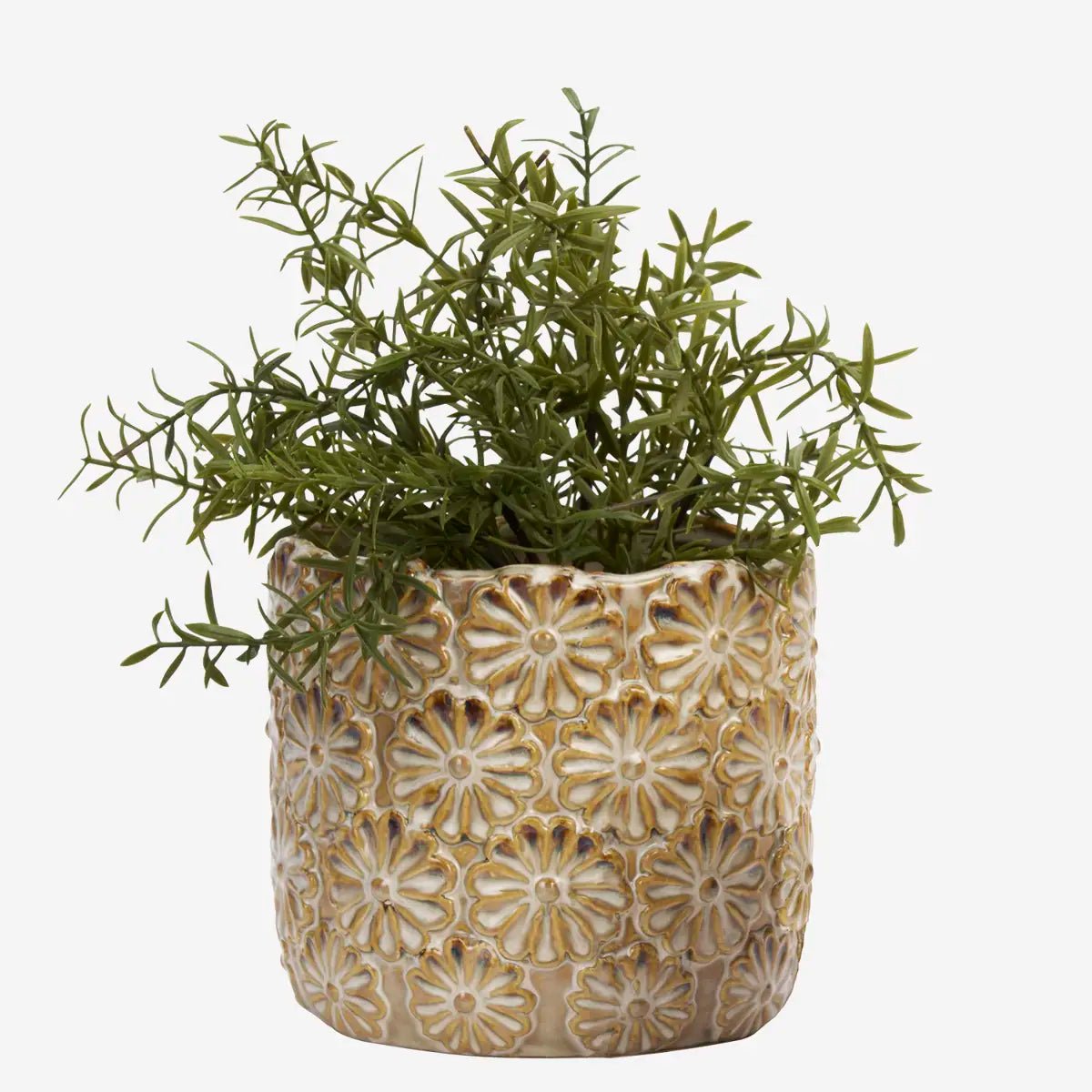 De potten zijn vervaardigd uit steengoed en afgewerkt met een reactief glazuur in zand- en off white tinten. Met verfijnde reliëf van bloemmotieven.