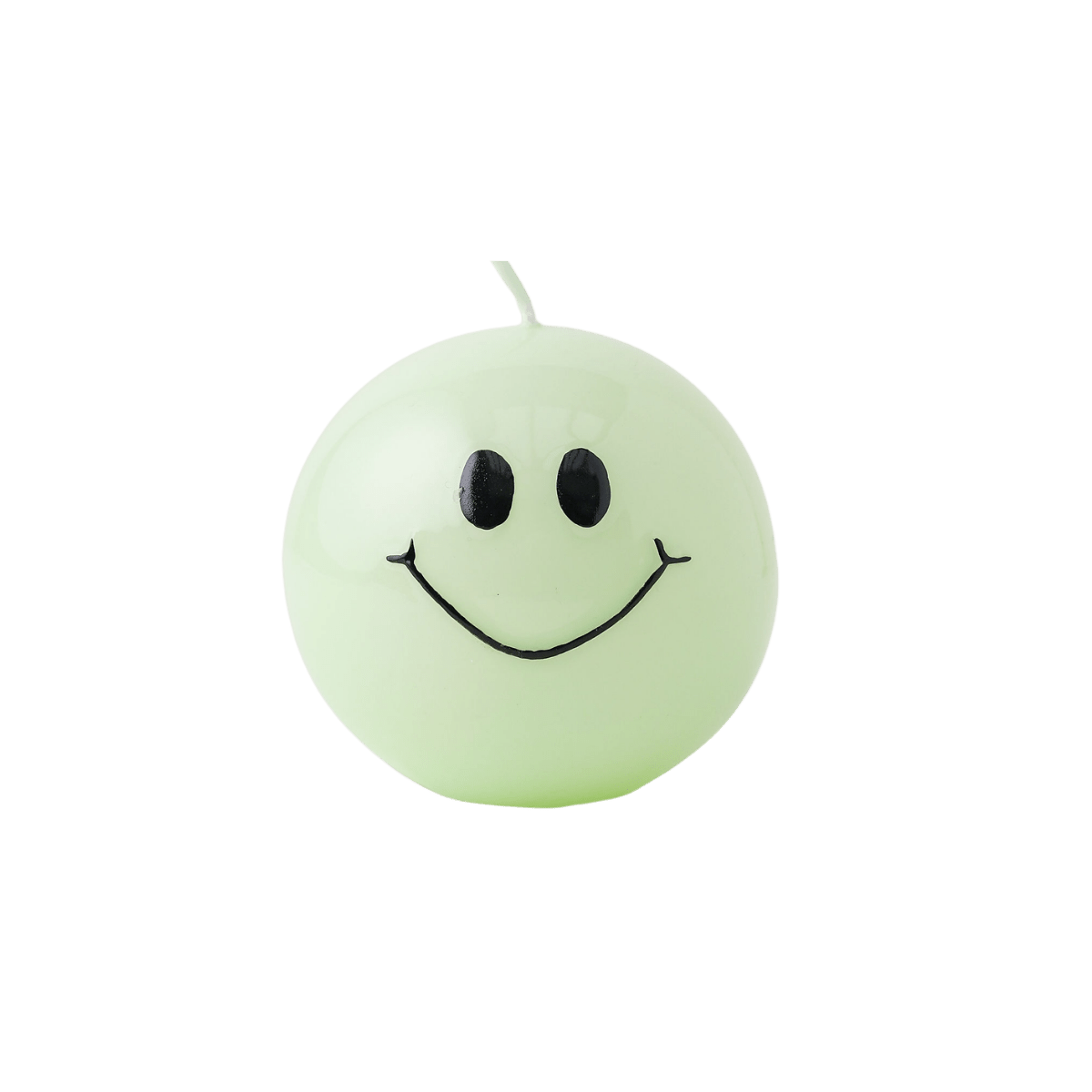 Een bolkaars in het mint met een zwart smiley gezicht erop.