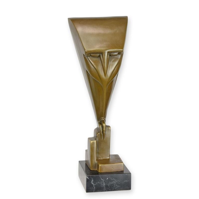 Een bronzen art deco sculptuur van een uit op voet ter decoratie voor in huis.