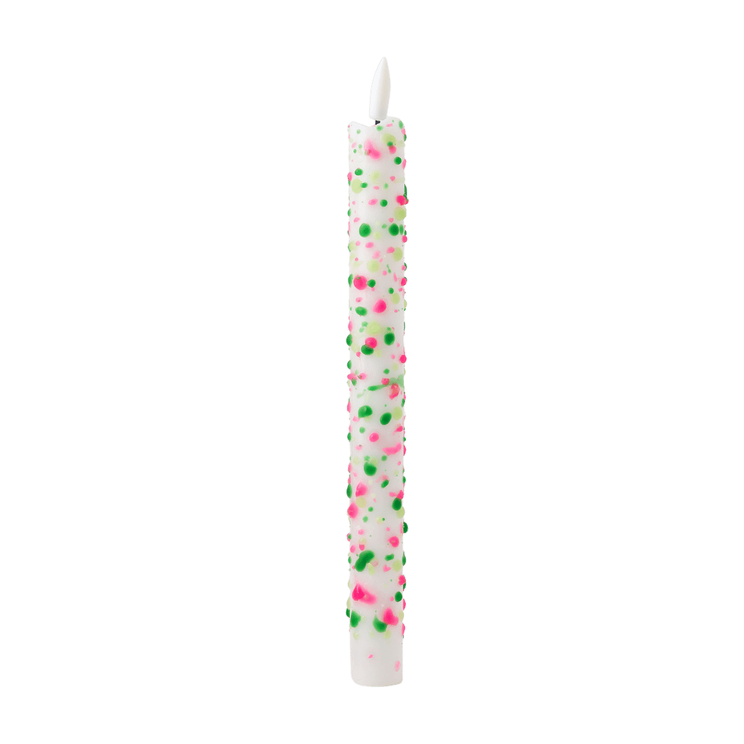 e witte basis is rijkelijk versierd met roze en groene spetters, waardoor deze ledkaars een frisse, artistieke uitstraling krijgt.