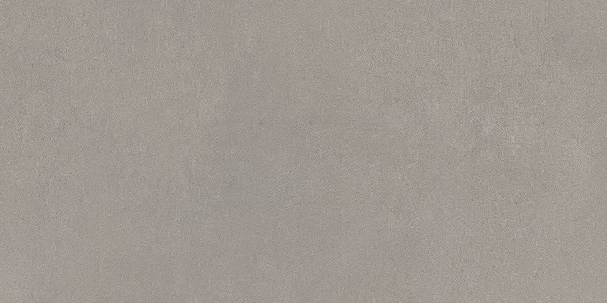 Taupe betonlook vloertegel met lichte kleurverschillen in het oppervlak.
