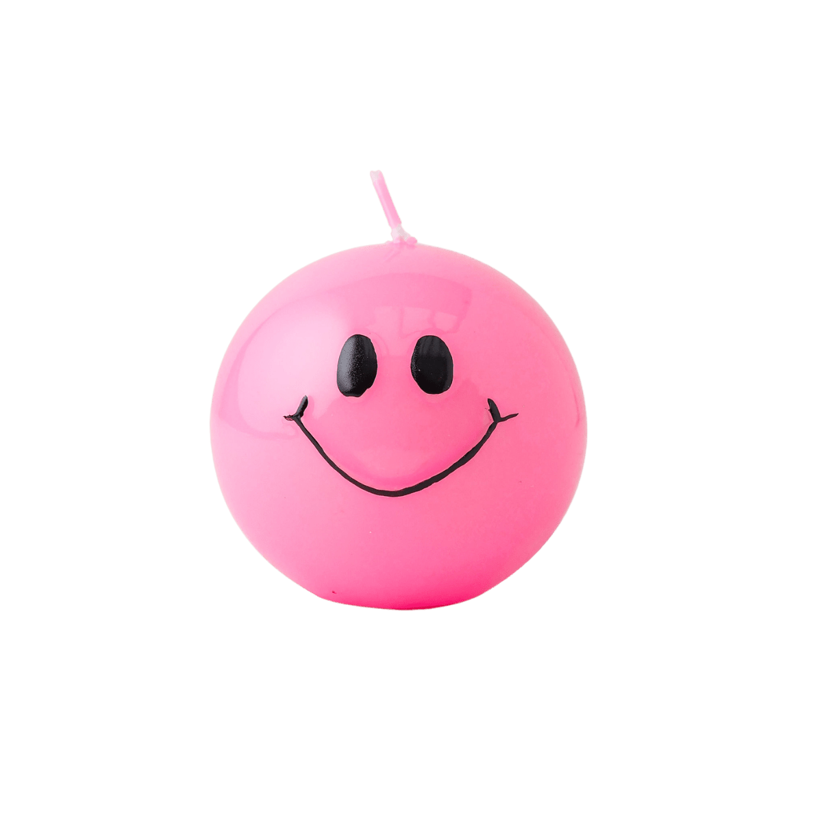 Handgemaakte bolkaars  in roze rond met een zwart smiley gezicht erop.