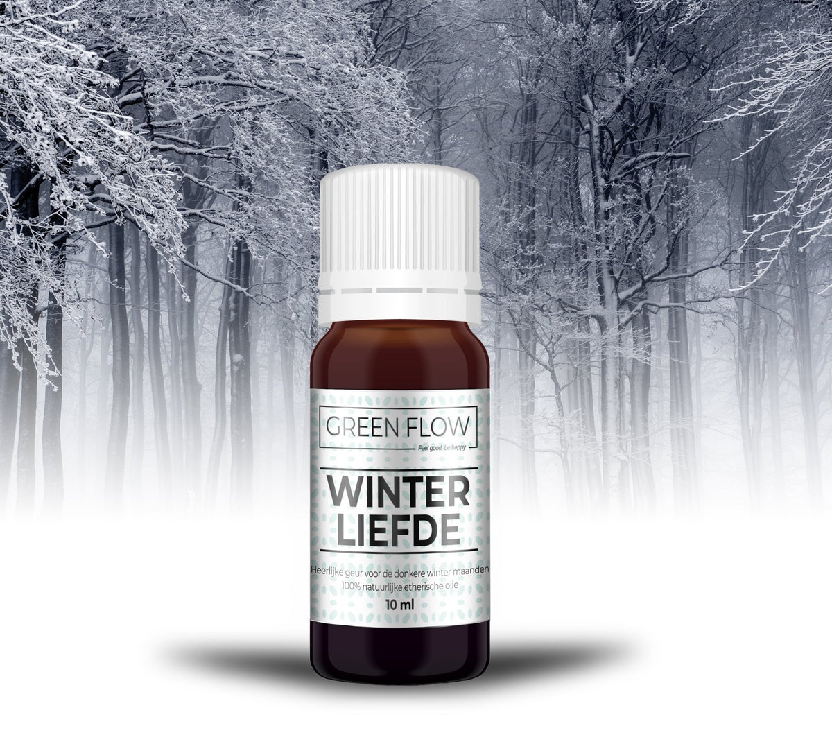 Bruin glazen flesje etherische olie van 10 ml voor een besneeuwd winterbos.