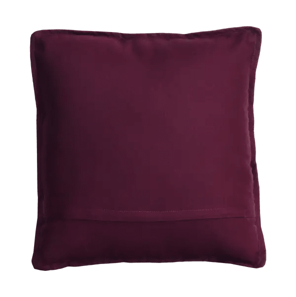 Achterzijde van het aubergine canvaskussen met horizontale sluiting onderin.